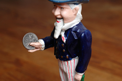 Uncle Sam, Holding a Dime