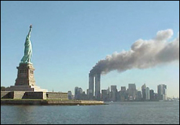national_park_service_9-11_statue_of_liberty_and_wtc_fire