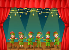90963756 - Christmas elves performing on stage