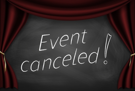 23330555 - caption "event canceled" written on the board with stage curtains.