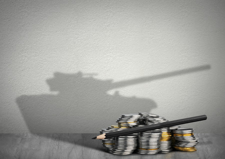 55015762 - financing war concept, money with tank shadow